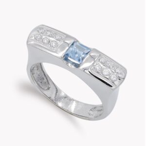 18K SORTIJA ORO BLANCO CIRCONITA AGUAMARINA Y BLANCAS. ANCHO: 6,5 MM