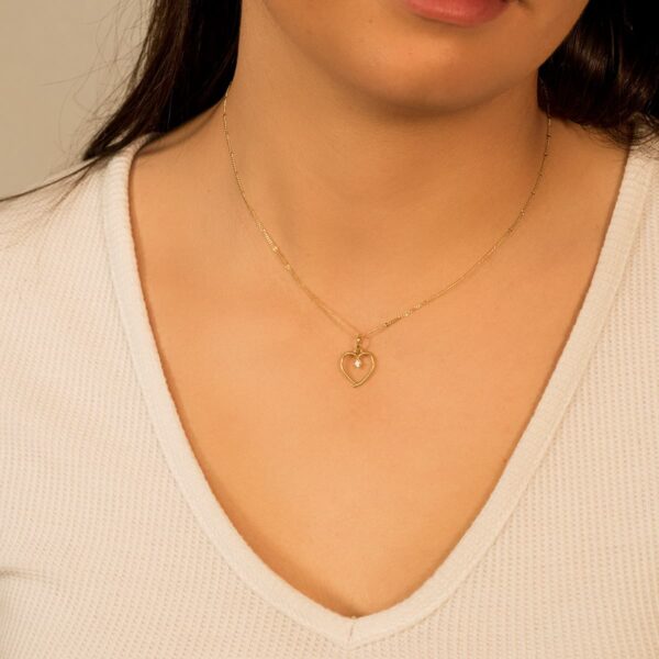 18K COLGANTE ORO AMARILLO CORAZON CON CIRCONITA DE 2 MM 13X12 MM - Imagen 2