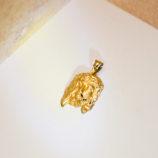 18K COLGANTE ORO AMARILLO CABEZA DE CRISTO ESTAMPADO. 30X19 MM - Imagen 3