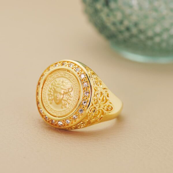 18K SELLO ORO AMARILLO MEDUSA VERSACE MATE 15 MM CON CIRCONITA ANCHO 21 MM - Imagen 3